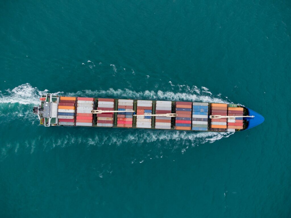 Aerial view of cargo container ship in the sea
